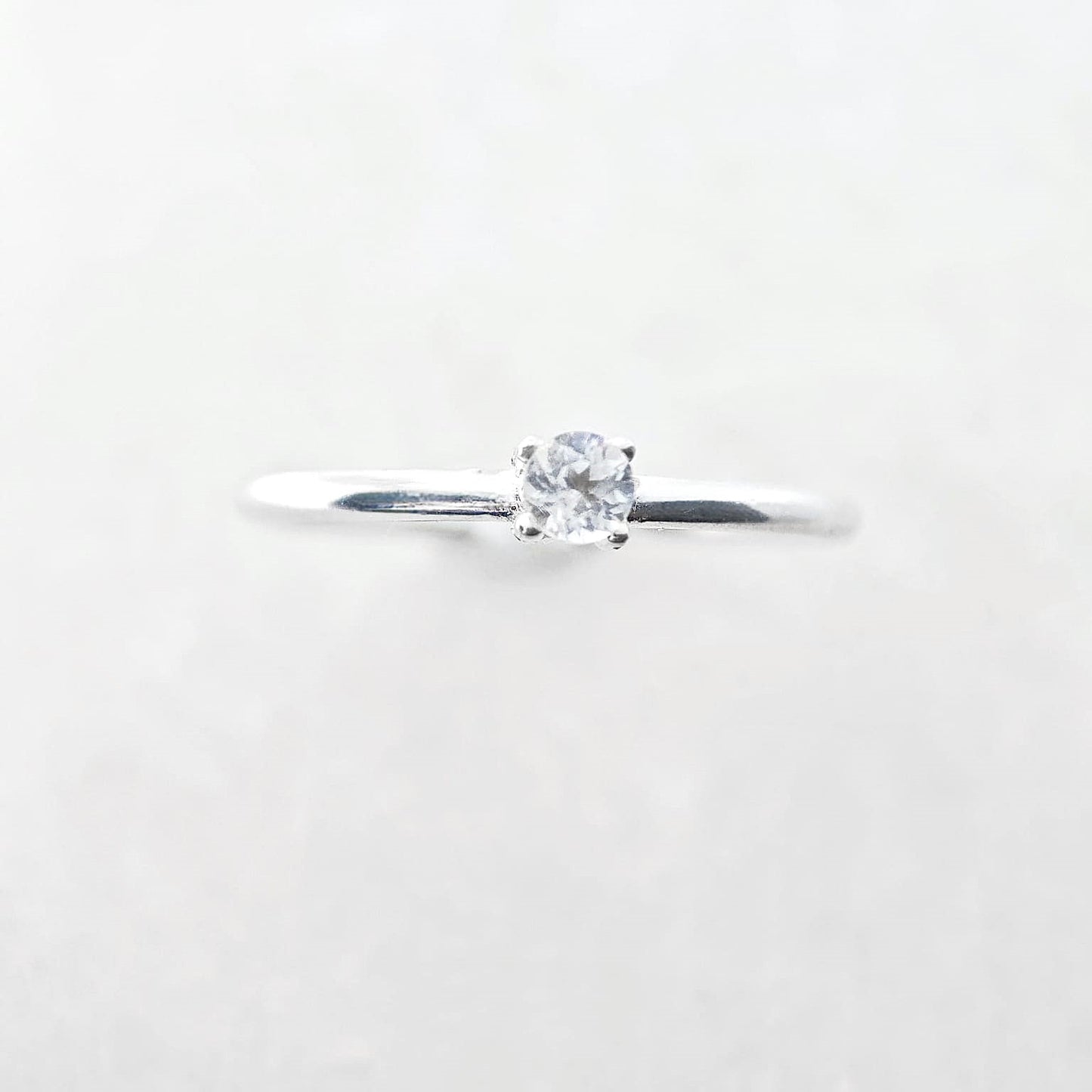 Round April Birthstone White Topaz Ring
